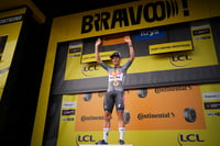 | Photo: AP/Daniel Cole : 10th Stage winner Jasper Philipsen celebrates on the podium